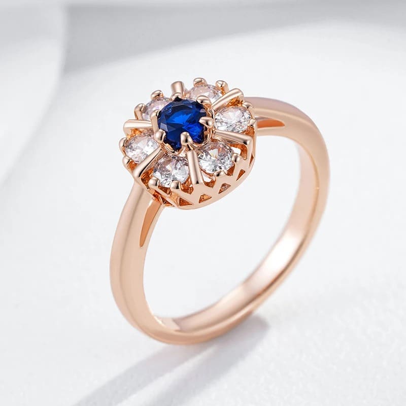 Anel flor ouro rosa 14k
Anel zircônia azul brilhante
Joias diárias femininas ouro 585
Anel delicado pedra azul
Presente joia alta qualidade 2024
Anel feminino floral tendência
Acessórios em ouro rosa para mulheres
Jóia minimalista com zircônia azul
Anel de noiva diferente floral
Joia fina para uso diário