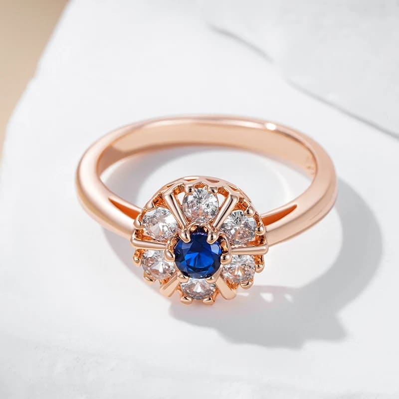 Anel Flor em Ouro Rosa 14K com Zircônia Azul Brilhante